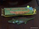 (BD2) VINTAGE HAPPY CROCK FRICTION TOY IN ORIGINAL BOX, 8 IN L. ITEM IS SOLD AS IS WHERE IS WITH NO