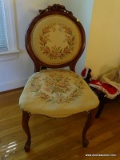 (LR) CHERRY ROSE CARVED SIDE CHAIR WITH FLORAL UPHOLSTERY- SEAT NEEDS TO BE RESTUFFED- 20 IN X 17 IN