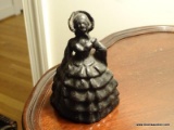 (LR) CAST IRON SOUTHERN BELLE DOORSTOP- 5 IN H, ITEM IS SOLD AS IS WHERE IS WITH NO GUARANTEES OR