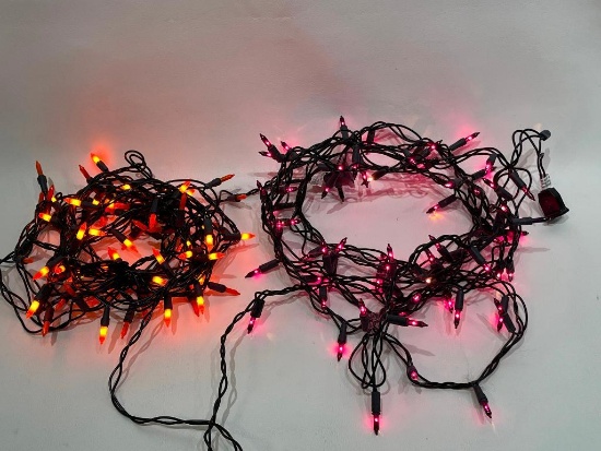 (9I) FIVE STRINGS OF PURPLE AND ORANGE HALLOWEEN LIGHTS, BUT TWO OF THE STRINGS ARE HALF OUT