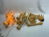 (10J) VINTAGE PLASTIC LIGHTED BONES CREEPY GRAVEYARD HALLOWEEN DECORATION. ONE STRING NOT