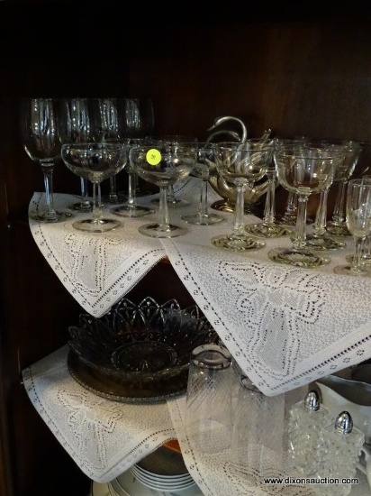 (DR) 2 SHELF LOT OF ASSORTED GLASSWARE. INCLUDES 4 WHITE WINE GLASSES 5 CHAMPAGNE, 6 SHALLOW
