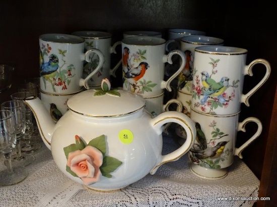 (DR) PARTIAL SHELF LOT TO INCLUDE A TELEFLORA TEAPOT, AND 14 ROYAL CROWN BIRD THEMED HOT CHOCOLATE
