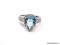 .925 STERLING SILVER LADIES 4 CT BLUE TOPAZ RING SIZE 8. ITEM IS SOLD AS IS WHERE IS WITH NO