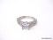 .925 STERLING SILVER LADIES 2 CT ENGAGEMENT RING. SIZE 7. ITEM IS SOLD AS IS WHERE IS WITH NO