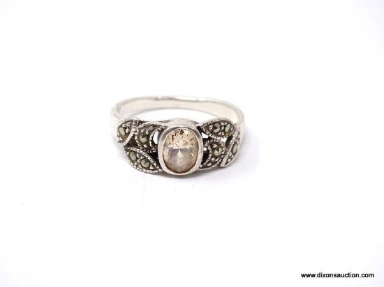 .925 STERLING SILVER LADIES 1 CT CITRINE RING. SIZE 8. ITEM IS SOLD AS IS WHERE IS WITH NO