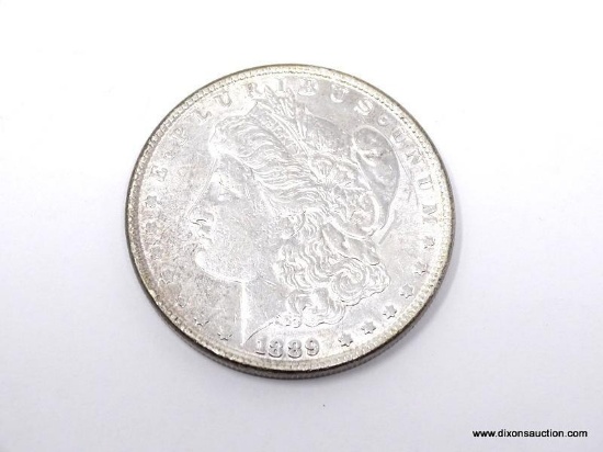 1889-P UNCIRCULATED MORGAN SILVER DOLLAR. ITEM IS SOLD AS IS WHERE IS WITH NO GUARANTEES OR