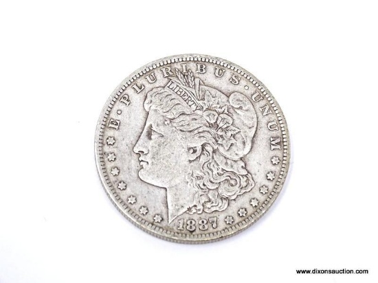 1887-O EXTRA FINE MORGAN SILVER DOLLAR. ITEM IS SOLD AS IS WHERE IS WITH NO GUARANTEES OR WARRANTY.