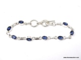.925 STERLING SILVER LADIES 4 CT TANZANITE BRACELET. ITEM IS SOLD AS IS WHERE IS WITH NO GUARANTEES