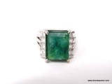 .925 STERLING SILVER LADIES 12 CT EMERALD RING SIZE 8. ITEM IS SOLD AS IS WHERE IS WITH NO