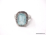 .925 STERLING SILVER LADIES 5 CT AQUAMARINE RING SIZE 8. ITEM IS SOLD AS IS WHERE IS WITH NO