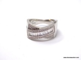 .925 STERLING SILVER LADIES 3 CT ANNIVERSARY RING SIZE 8. ITEM IS SOLD AS IS WHERE IS WITH NO