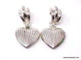 .925 STERLING SILVER LADIES HEART EARRINGS. ITEM IS SOLD AS IS WHERE IS WITH NO GUARANTEES OR