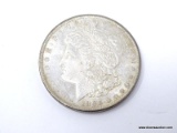 1885-O UNCIRCULATED MORGAN SILVER DOLLAR. ITEM IS SOLD AS IS WHERE IS WITH NO GUARANTEES OR