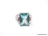 .925 STERLING SILVER LADIES 10 CT BLUE TOPAZ RING SIZE 8. ITEM IS SOLD AS IS WHERE IS WITH NO