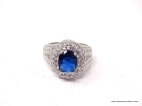 .925 STERLING SILVER LADIES 3 CT SAPPHIRE RING. SIZE 8. ITEM IS SOLD AS IS WHERE IS WITH NO