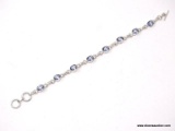 .925 STERLING SILVER LADIES 8 CT BLUE TOPAZ TENNIS BRACELET. ITEM IS SOLD AS IS WHERE IS WITH NO