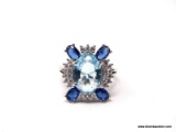 .925 STERLING SILVER LADIES 5 CT BLUE TOPAZ & SAPPHIRE RING. SIZE 8. ITEM IS SOLD AS IS WHERE IS