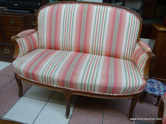 (R1) ESTATE OWNED PECAN WOOD FINISH LOVESEAT WITH STRIPE UPHOLSTERED BACK, ARMS, AND SEAT. MEASURES