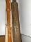 (BAY 7) 2 PIECE LOT TO INCLUDE A WOODEN FLUTE AND A WOODEN CARVED WALL DECORATION. ITEM IS SOLD AS
