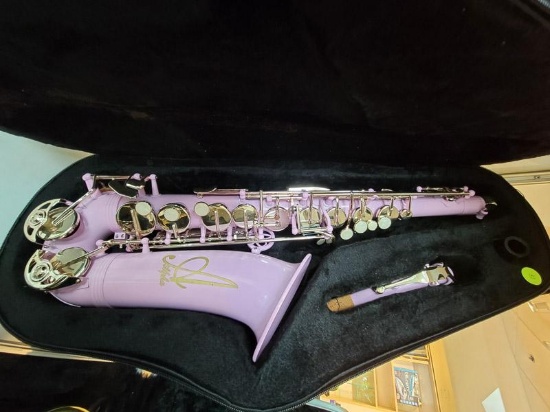 (SC) BRAND NEW ALPHA PURPLE SAXOPHONE WITH HARD CARRYING CASE. ITEM IS SOLD AS IS WHERE IS WITH NO