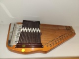 (BAY 7) AUTOHARP MADE BY OSCAR SCHMIDT. ITEM IS SOLD AS IS WHERE IS WITH NO GUARANTEES OR WARRANTY.