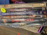 (BAY 7) BAG LOT OF DVDS TO INCLUDE TITLES SUCH AS 8 MILE, 3:10 TO YUMA, THE OUTLAW JOSEY WALES, WHY