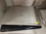 (BAY 7) LOT OF 2 LAPTOPS. 1 IS A HP ELITEBOOK, AND 1 IS A HP PAVILION. UNSURE OF WORKING CONDITION.