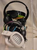 (BAY 7) SMALL TUB CONTAINING ASSORTED CHILDRENS HEADPHONES. ITEM IS SOLD AS IS WHERE IS WITH NO