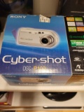 (BAY 7) SONY CYBER SHOT DSC-P100. IS IN BOX. ITEM IS SOLD AS IS WHERE IS WITH NO GUARANTEES OR