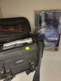 (BAY 7) JVC CAMCORDER IN CARRYING BAG AND A MONSTER CABLE CAMCORDER TO TV CORD. ITEM IS SOLD AS IS