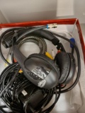 (BAY 7) ASSORTED BOX LOT TO INCLUDE A SET OF WIRELESS HEADPHONES, A BIKE CABLE LOCK, RCA CABLES,