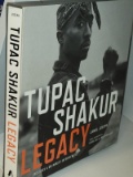 (BAY 7) TUPAC SHAKUR LOT TO INCLUDE BACK IN THE DAY, TUPAC REMEMBERED, AND TUPAC SHAKUR LEGACY. ITEM