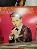 (BAY 7) BOX LOT OF ASSORTED RECORDS TO INCLUDE HANK WILLIAMS, OSCAR BRAND, MERLE TRAVIS AND MUCH