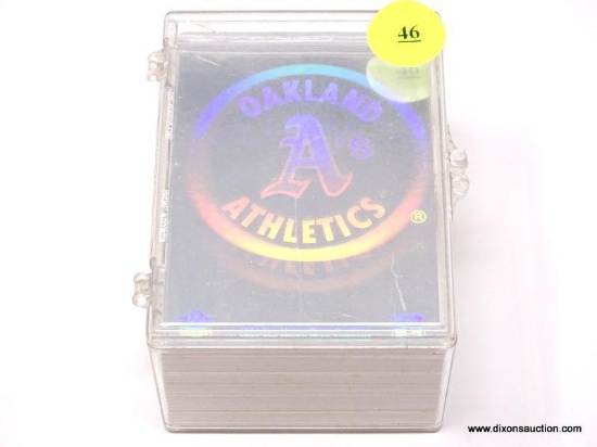 CLEAR PLASTIC BOX CONTAINING ASSORTED BASEBALL CARDS. ITEM IS SOLD AS IS WHERE IS WITH NO GUARANTEE