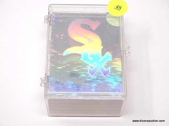 CLEAR PLASTIC BOX CONTAINING ASSORTED BASEBALL CARDS. ITEM IS SOLD AS IS WHERE IS WITH NO GUARANTEE