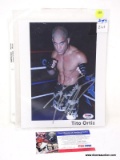 TITO ORTIZ SIGNED PHOTOGRAPH. IS UNFRAMED. MEASURES 8 IN X 10 IN. HAS COA. ITEM IS SOLD AS IS WHERE