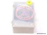 CLEAR PLASTIC BOX CONTAINING ASSORTED BASEBALL CARDS. ITEM IS SOLD AS IS WHERE IS WITH NO GUARANTEE