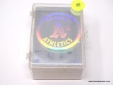 CLEAR PLASTIC BOX CONTAINING ASSORTED BASEBALL CARDS. ITEM IS SOLD AS IS WHERE IS WITH NO GUARANTEE