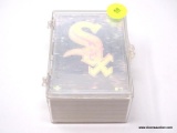 CLEAR PLASTIC BOX CONTAINING ASSORTED BASEBALL CARDS. ITEM IS SOLD AS IS WHERE IS WITH NO GUARANTEE