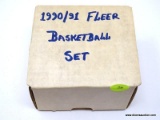 1990/91 FLEER BASKETBALL SET IN BOX. BOX APPEARS TO BE FULL. ITEM IS SOLD AS IS WHERE IS WITH NO