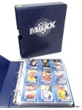 MAXX RACE CARDS PREMIER SERIES BINDER FILLED WITH ASSORTED RACING CARDS. ITEM IS SOLD AS IS WHERE IS