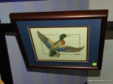 FRAMED NEEDLEPOINT OF MALLARD DUCK IN FLIGHT. IS DOUBLE MATTED AND FRAMED IN A WOODEN FRAME.