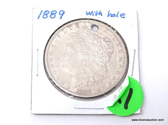 1889 MORGAN DOLLAR WITH HOLE. ITEM IS SOLD AS IS, WHERE IS, WITH NO GUARANTEE OR WARRANTY. NO