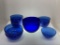 (9I) COBALT BLUE GLASS 7.5 INCH SALAD BOWL, AND SMALL BOWLS. SOME VARIATIONS, NOT A MATCHING SET.