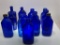 (10J) ANTIQUE COBALT BLUE GLASS MILK OF MAGNESIA MEDICINE BOTTLES 7-INCH