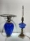 (2B) TWO LAMPS, COBALT GLASS, AND COBALT-CUT-TO-CLEAR CRYSTAL LAMP WITH MARBLE BASE. BOTH AS-IS FOR
