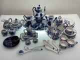 (6F) ASSORTMENT OF MINIATURE CHINA TEA SETS. TALLEST TEAPOT IS 5 INCHES. THERE ARE THREE COMPLETE