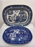 (6F) TWO LARGE BLUE WILLOW TRANSFERWARE PLATTERS INCLUDING 18.5 INCH PLATTER WITH LION MARK; AND