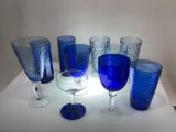 (9I) ASSORTED COBALT AND BLUE DRINKING GLASSES INCLUDING INDIANA WHITEHALL CUBIST SKY BLUE BY